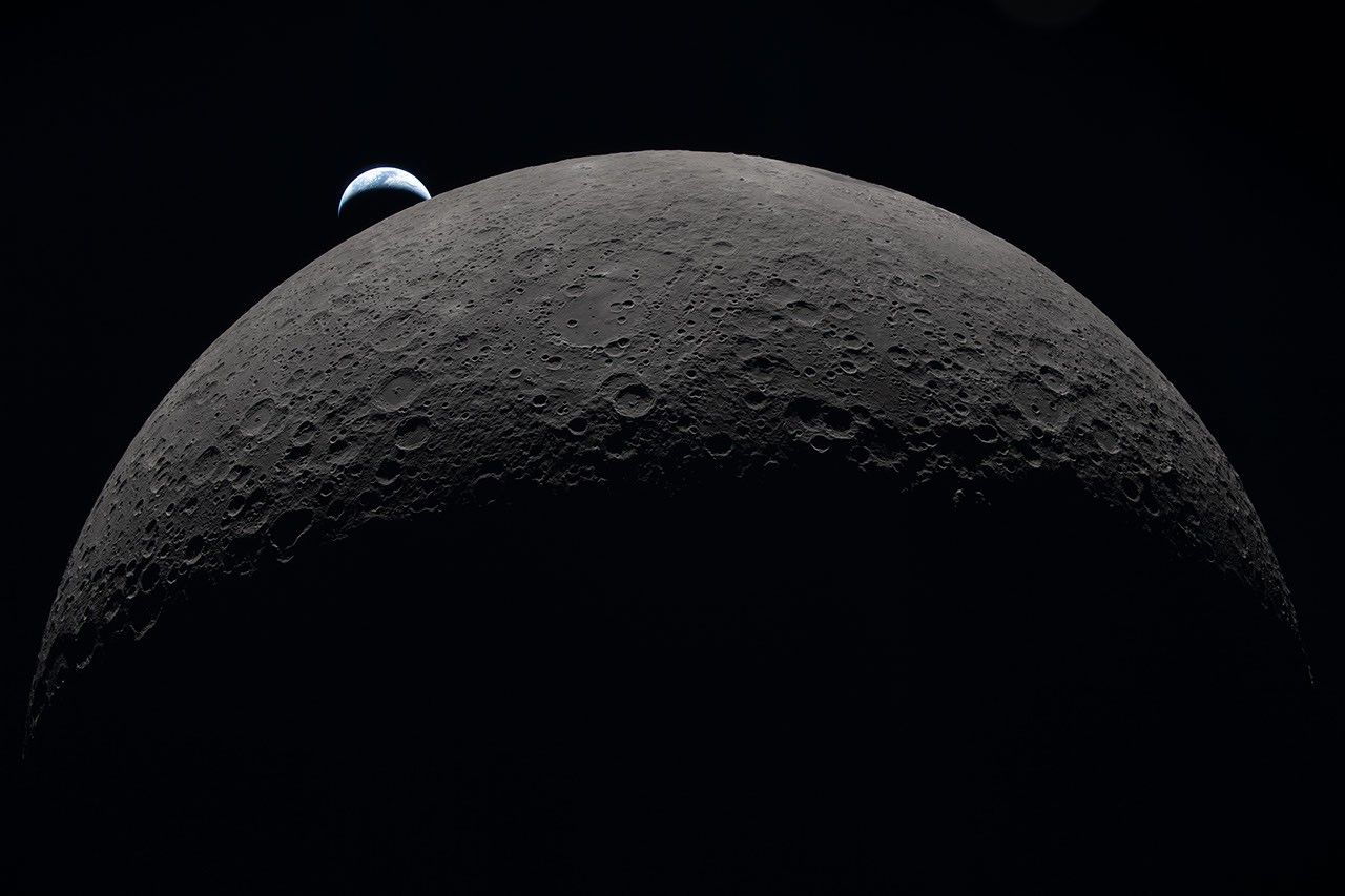 Earth seen from the lunar far side in a NASA Earth Observatory image.